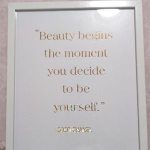 A Coco Chanel quote in a picture